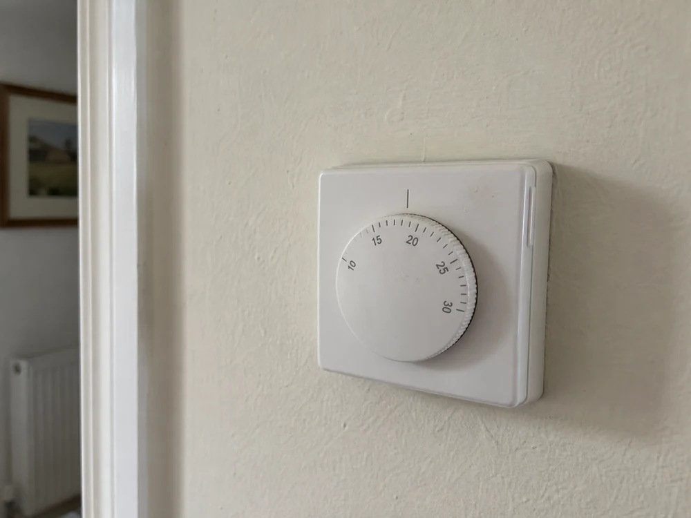 Example wall-mounted room thermostat.
